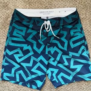 American Eagle Mens Blue Abstract Swim trunks Size Small perfect for summer
